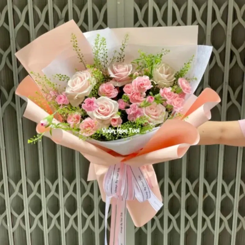Bó hoa hồng pastel và baby breath